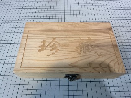 Použité - Dřěvěná Krabička s bublinkami - Rozměr foto