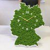 Machové hodiny Mapa Nemecka zavesené na stene v interiéri – Aurimoss