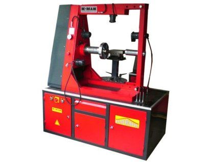 Stroj na vyrovnávanie diskov