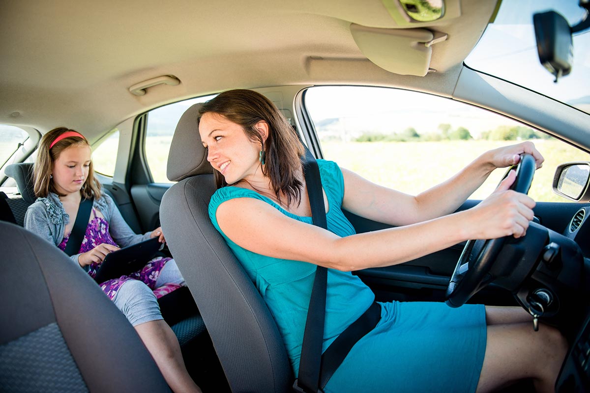 Mother-and-child-in-car-mother-distracted-from-driving