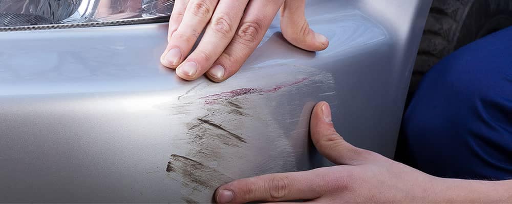 Car-scratches-silver-bumper_45002223
