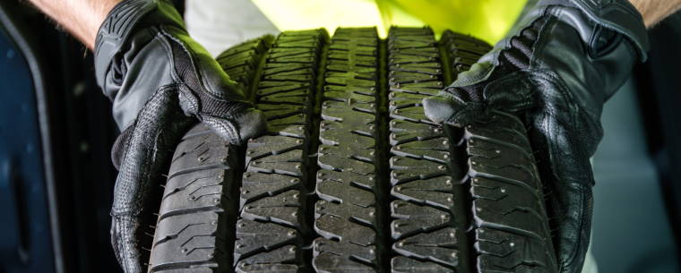 technicican_inspecting_a_new_tyre