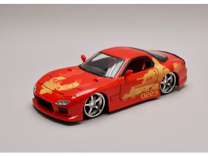 Mazda RX 7 1995 Orange JLS Rychle a zb. (Fast & Furious) 1 24 Jada Toys 30747 01