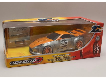 Nissan 350Z 2003 20th anniversary series leštěný kov oranžová 1 24 Jada Toys 45001 02