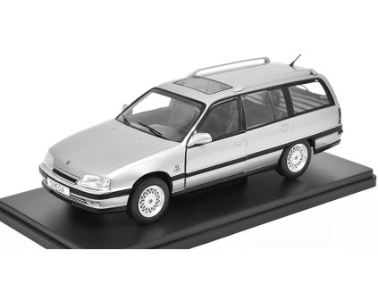 Opel Omega A2 Caravan 1:24 - WhiteBox  Opel Omega A-2 Caravan - kovový model auta