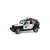 Policejní auto RAM 2500 s policistou BRUDER