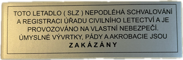 Štítek Toto letadlo...... Barva: Bílá