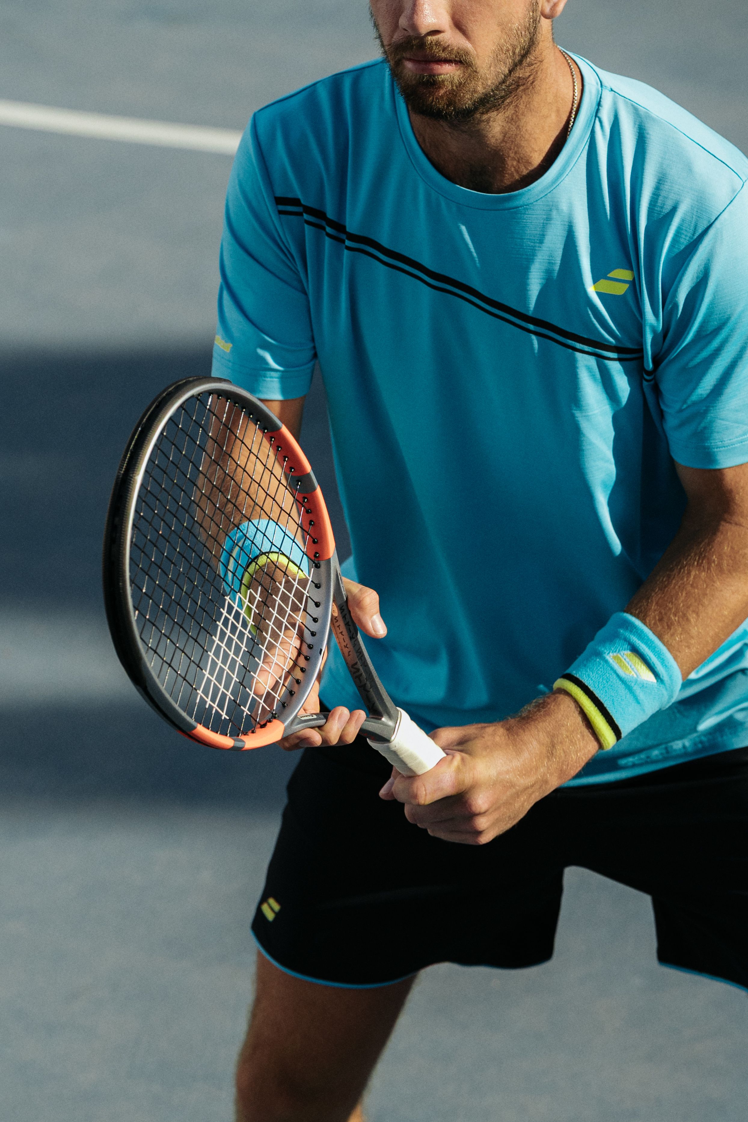 Cameron Norrie s tenisovou raketou Babolat Pure Strike