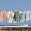 LÄSSIG Beach Poncho 2025 palms deep olive