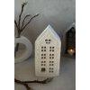 Dekorativn svícen ve tvaru domu
