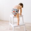You can place any absorbent insert into the waterproof diaper cover, including a prefold diaper | Bamboolik