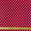 174251 bavlna vzorovana biele bodky 1 cm na tmavocervenom