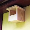 Half-nesting box for birds BAT-MAN Phoeni suitable for black redstarts, made of natural wood