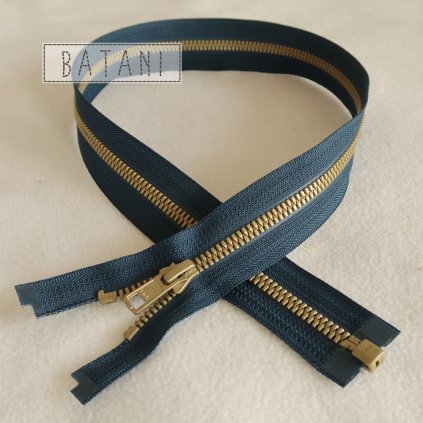 zip YKK - modrý, zlaté zoubky