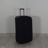 Černý cestovní kufr na kolečkách Travel