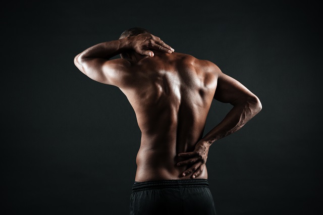 back-view-young-african-sports-man-feeling-pain-his-back