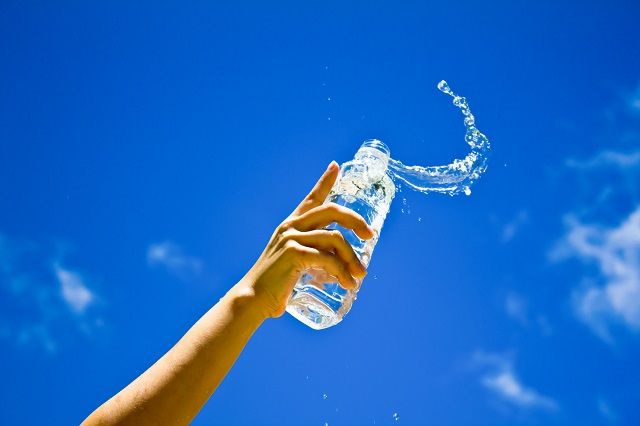 human-hand-holding-bottle-water