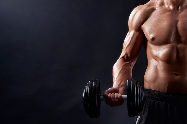 young-fitness-man-in-studio