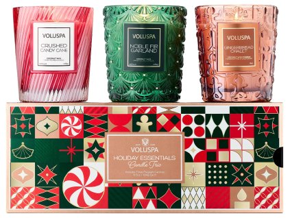 Dárkový set tří vánočních svíček Voluspa Holiday Essentials ve skleněných dózách.