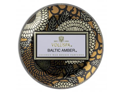 Viečko plechovej dózy Voluspa Baltic Amber so zlatým zdobením.
