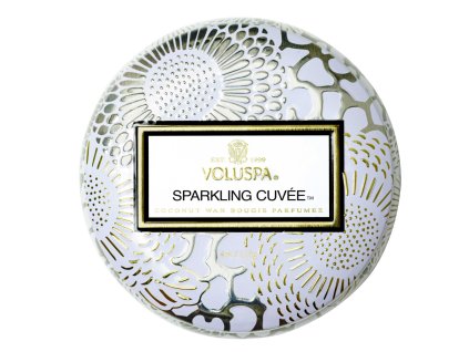 Viečko plechovej dózy Voluspa Sparkling Cuveé so zlatým zdobením.