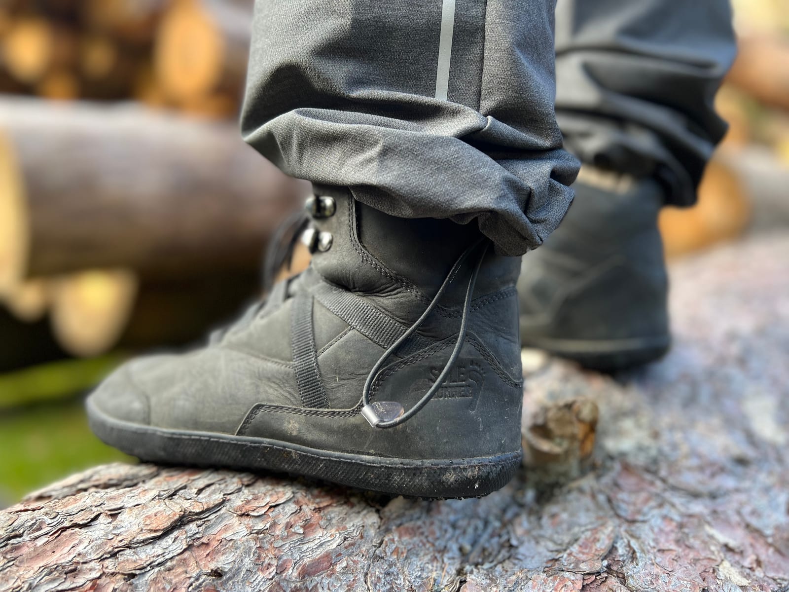 Barefoot hiking boots on a woodland trail