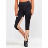 w kalhoty craft adv essence wind tights cerna s oranzovou