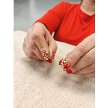 Zlaté elegantní náušnice vlnky s kamínky