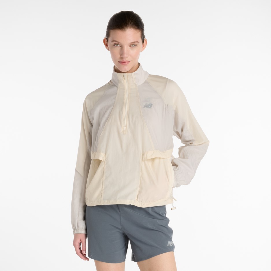 New Balance bunda Better Run Water Resistant Jacket beige Velikost: M