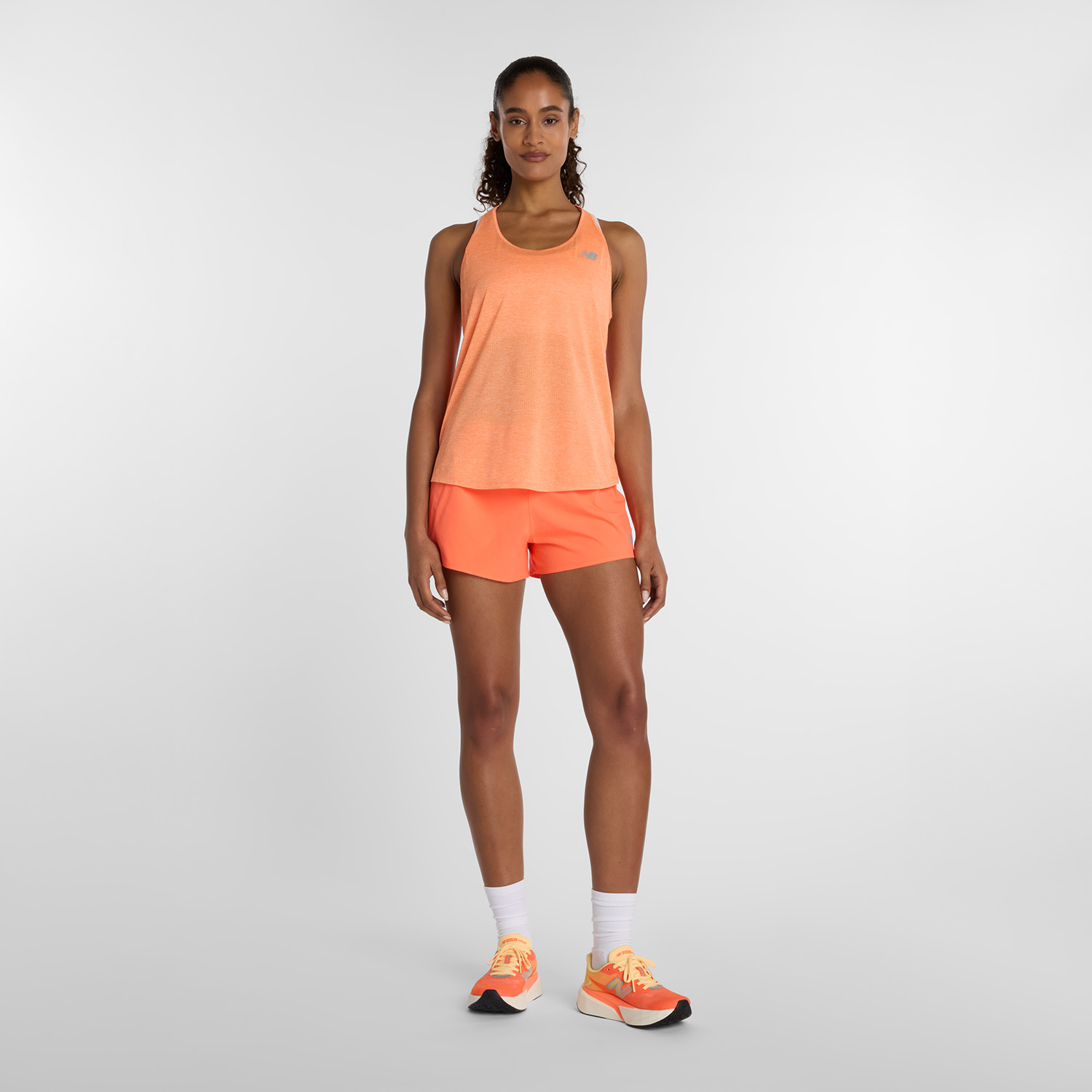 New Balance tielko Athletics Tank W orange Velikost: L