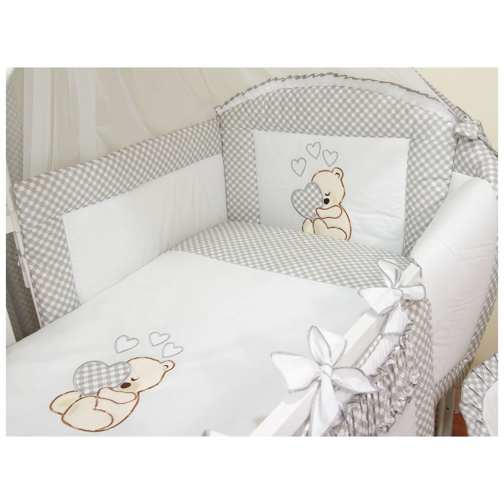 Šedé srdce uvnitř postýlky