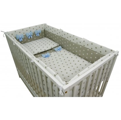 Hvězdičky na bílošedém pozadí s modrými mašličkami s lůžkovinou