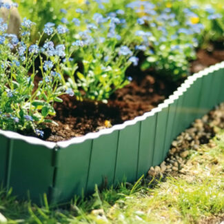 Jak a proč oddělit záhony od trávníku?