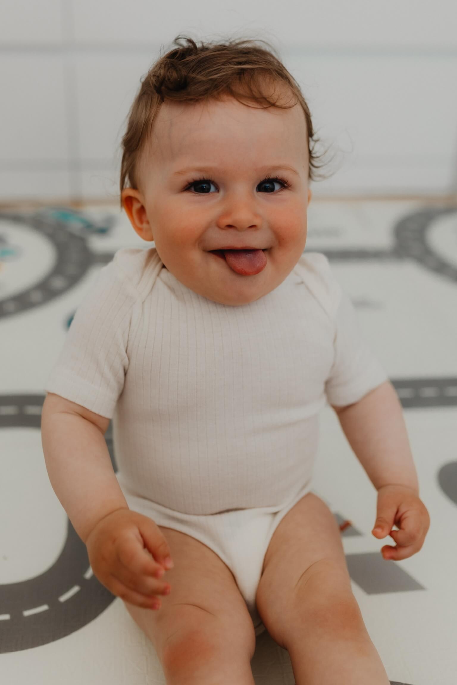 Dětské body z merino vlny, bavlny a hedvábí Cosilana s krátkým rukávem krémové Velikost: 98/104