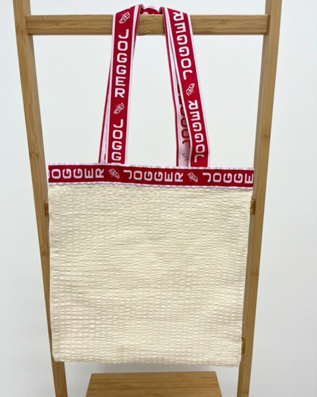 B.E.S. - Petrovice, s.r.o. Látková taška - 31x33cm - vzor Béžová s červeným lemem