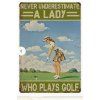 Kovová cedule s golfovým motivem