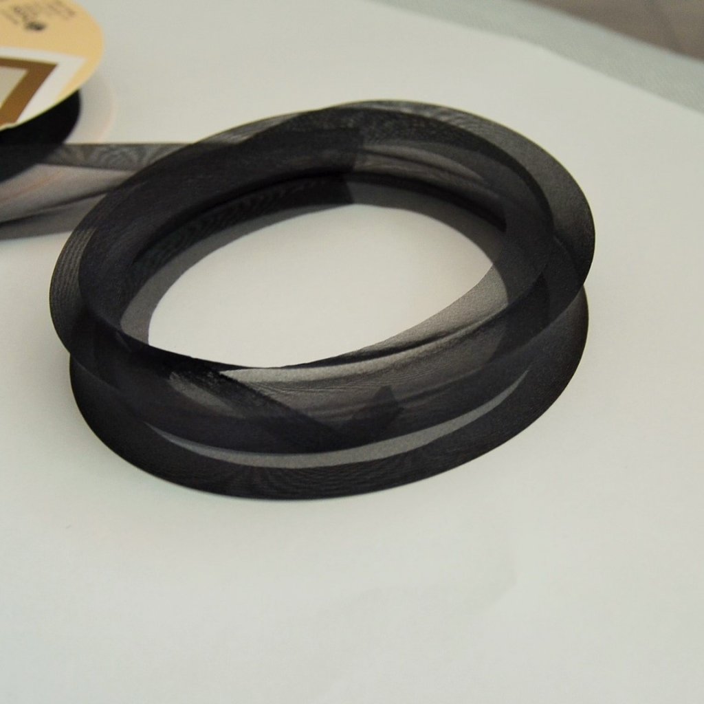 0,5 m šikmý proužek zažehlený černý 18 mm (organza)