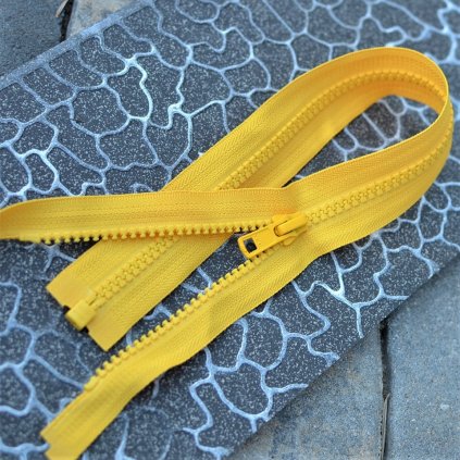 dělitelný kostěný zip YKK - 55 cm, teplejší žlutá