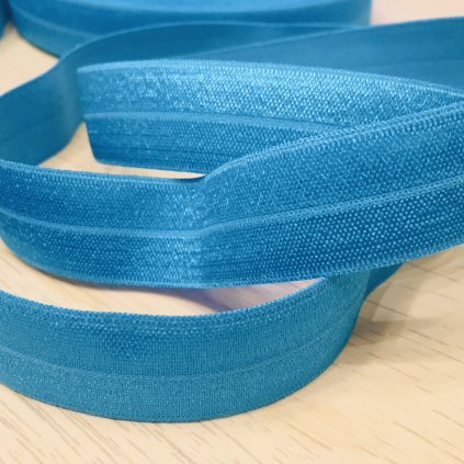 0,5 m půlená lemovací pruženka 20 mm tyrkysová