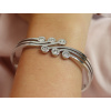 Náramek na ruku z chirurgické oceli - pevný, vlnitý s čirými kamínky zirkonů 2002262