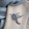 Brož kolibřík modrý zirkon- stříbrné barvy 9002100-2