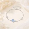 Jemný stříbrný náramek s modrým motýlem a zirkony