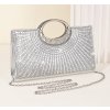 Elegantní stříbrná kabelka s krystaly a kovovým madlem