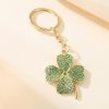 Designová zlatá klíčenka Čtyřlístek pro štěstí se zirkony