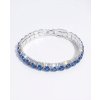 Výrazný třpytivý náramek s modrými krystaly