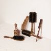 The Oribe Round Brush Medium 74mmThe Oribe Hair Pick 2