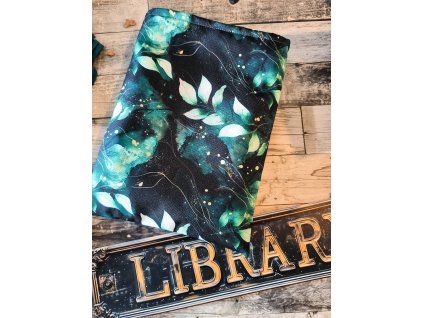 Büchertasche mit grünen Blättern