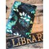 Büchertasche mit grünen Blättern