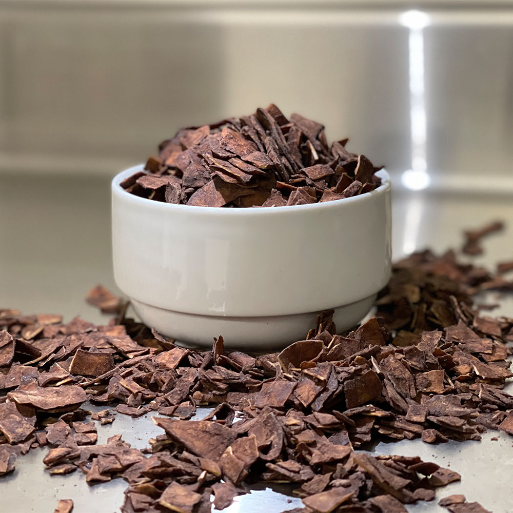 BrainMax Pure Kokosové chipsy v čokoládě BIO, sampler 20 g Obrázek