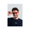 31224 3 smiling man adjusting sunglasses in studio